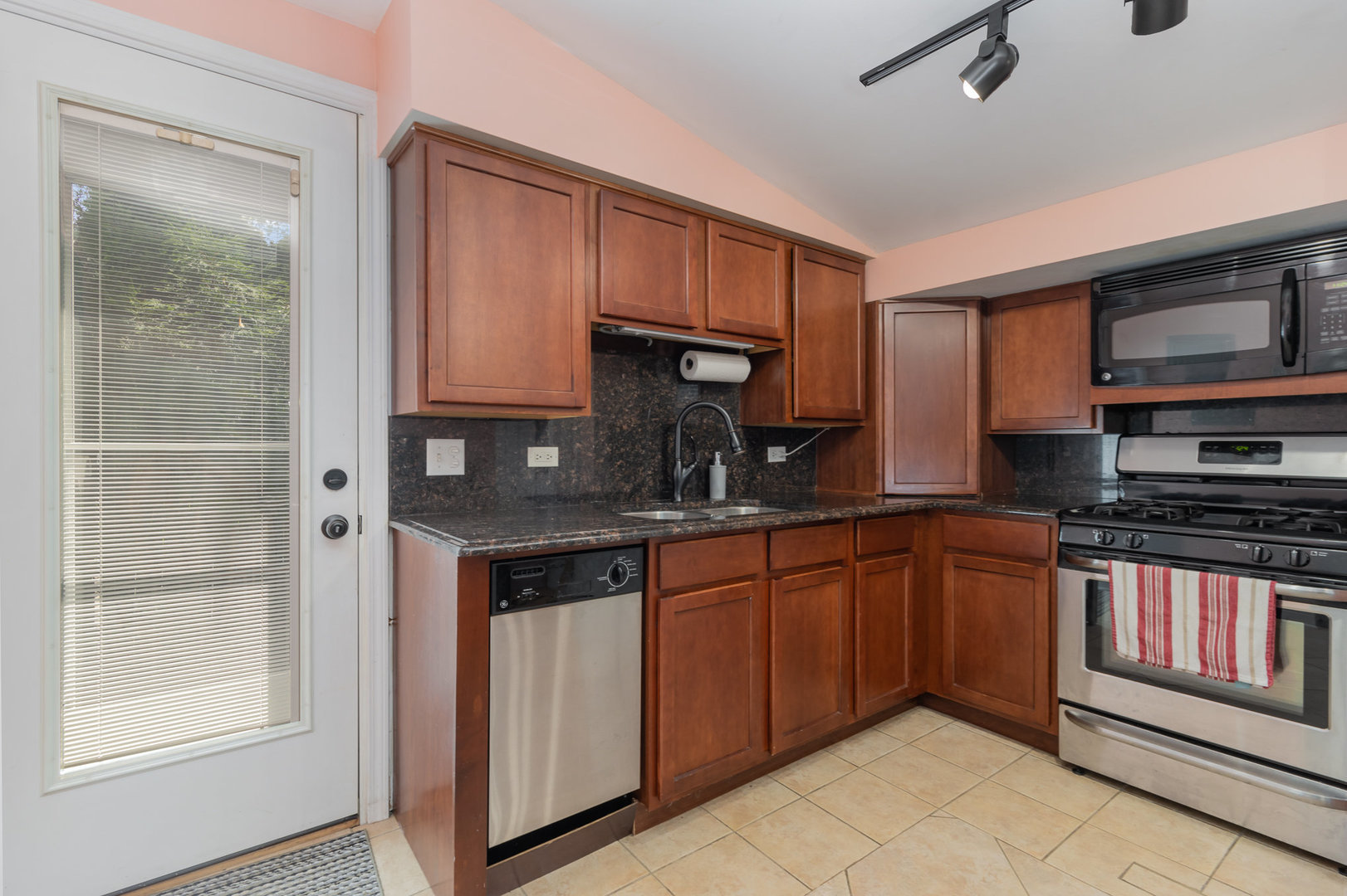 2121 Pine Road Homewood, IL 60430 - Photo 8 of 20 a kitchen with stainless steel appliances granite countertop a stove and a sink