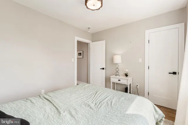 a bathroom with a sink a toilet and a shower