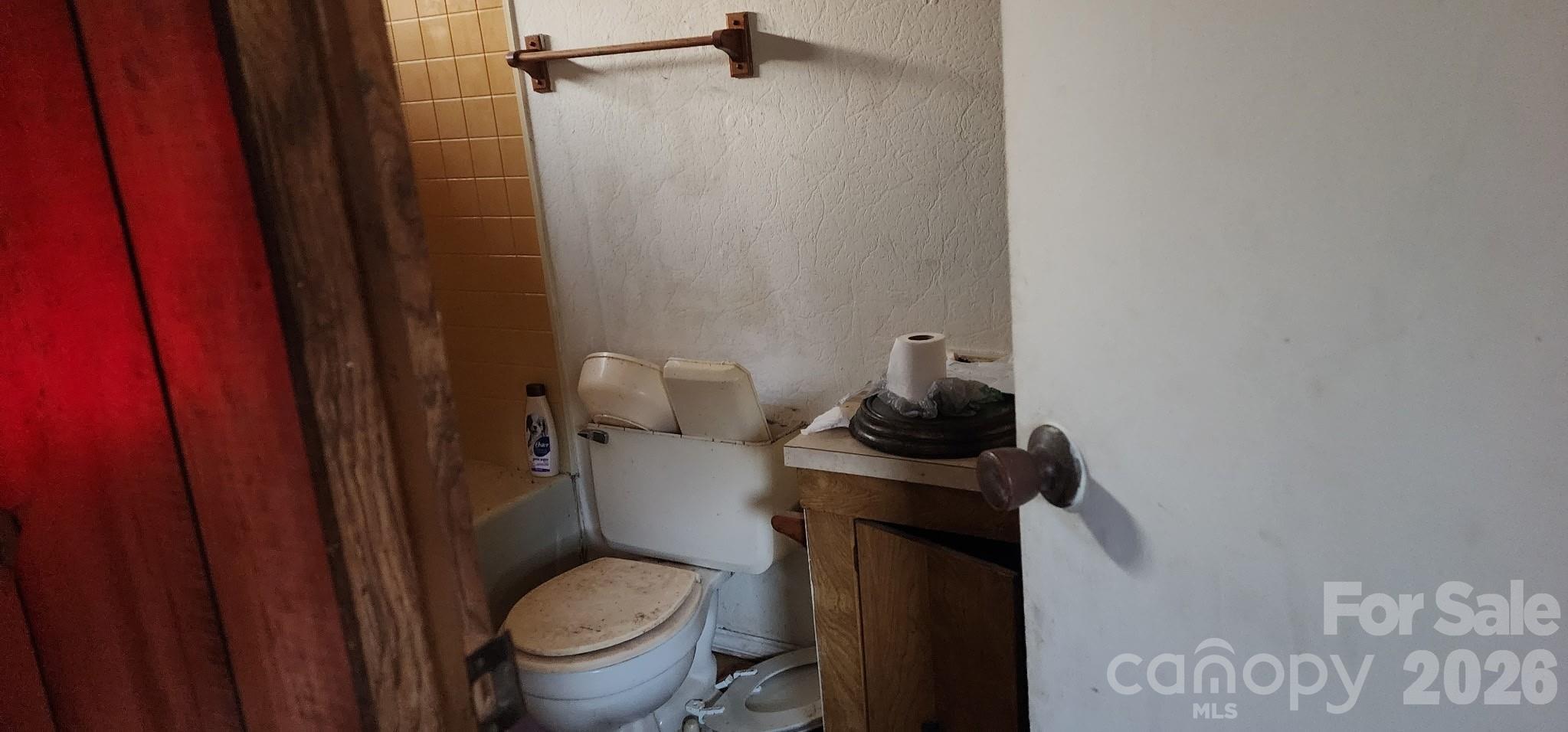 1142 Hidden View Loop Marion, NC 28752 - Photo 16 of 16 a bathroom with a toilet and a sink