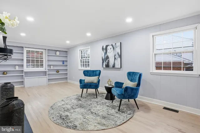 a view of a livingroom with furniture and a couch