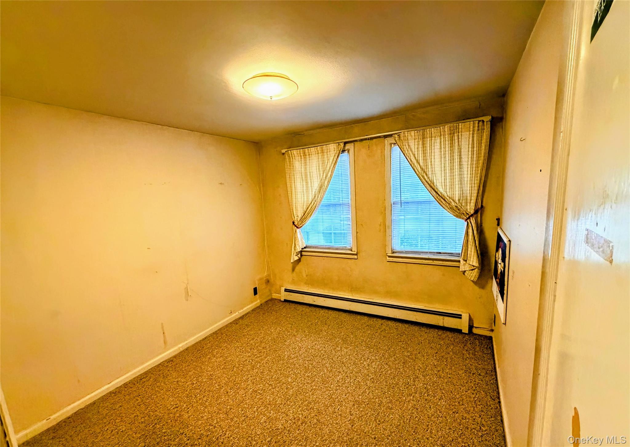 537 Ryders Lane East Brunswick, NJ 08816 - Photo 11 of 13 a view of an empty room with a window