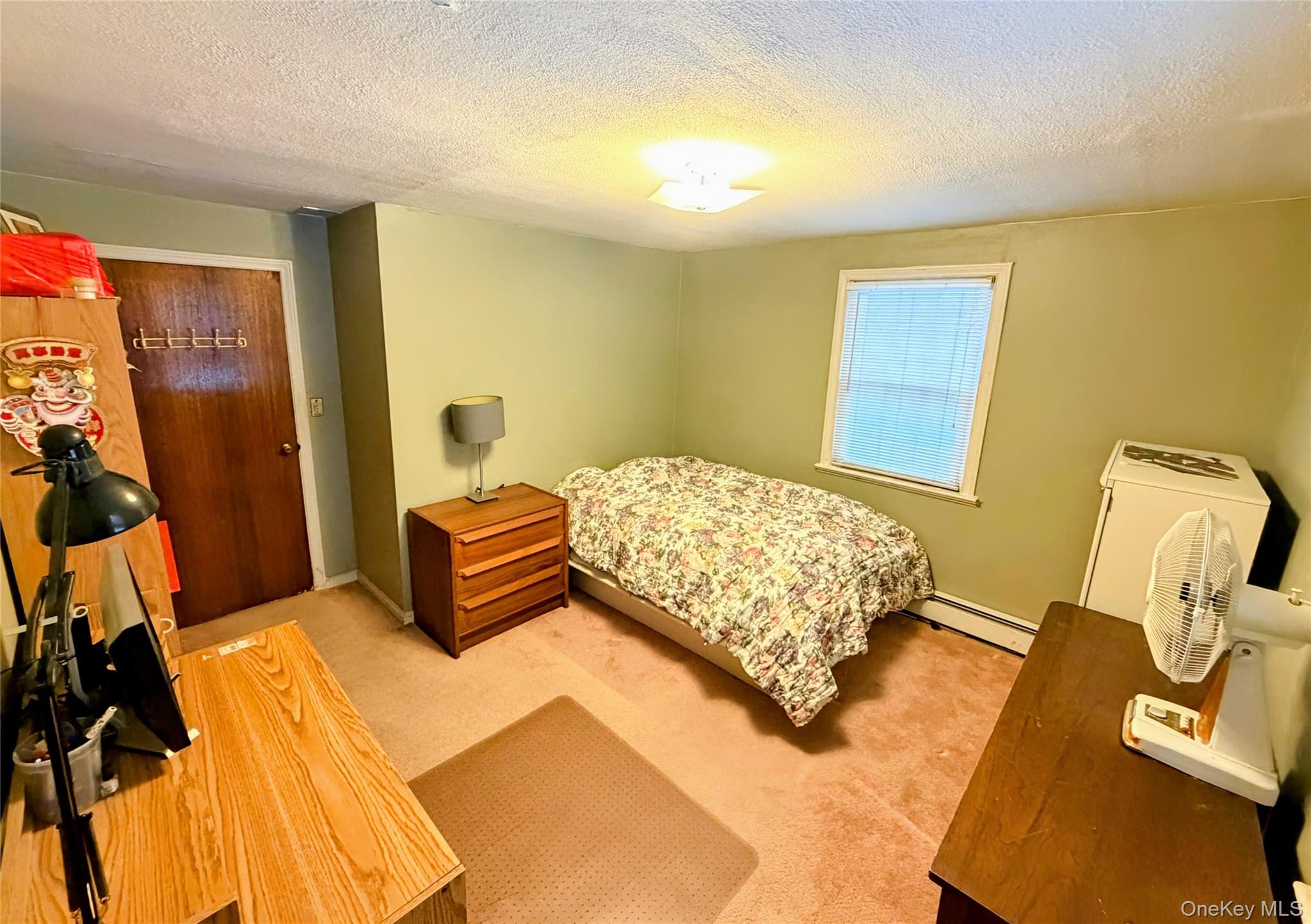 537 Ryders Lane East Brunswick, NJ 08816 - Photo 13 of 13 a bedroom with a bed and wooden floor