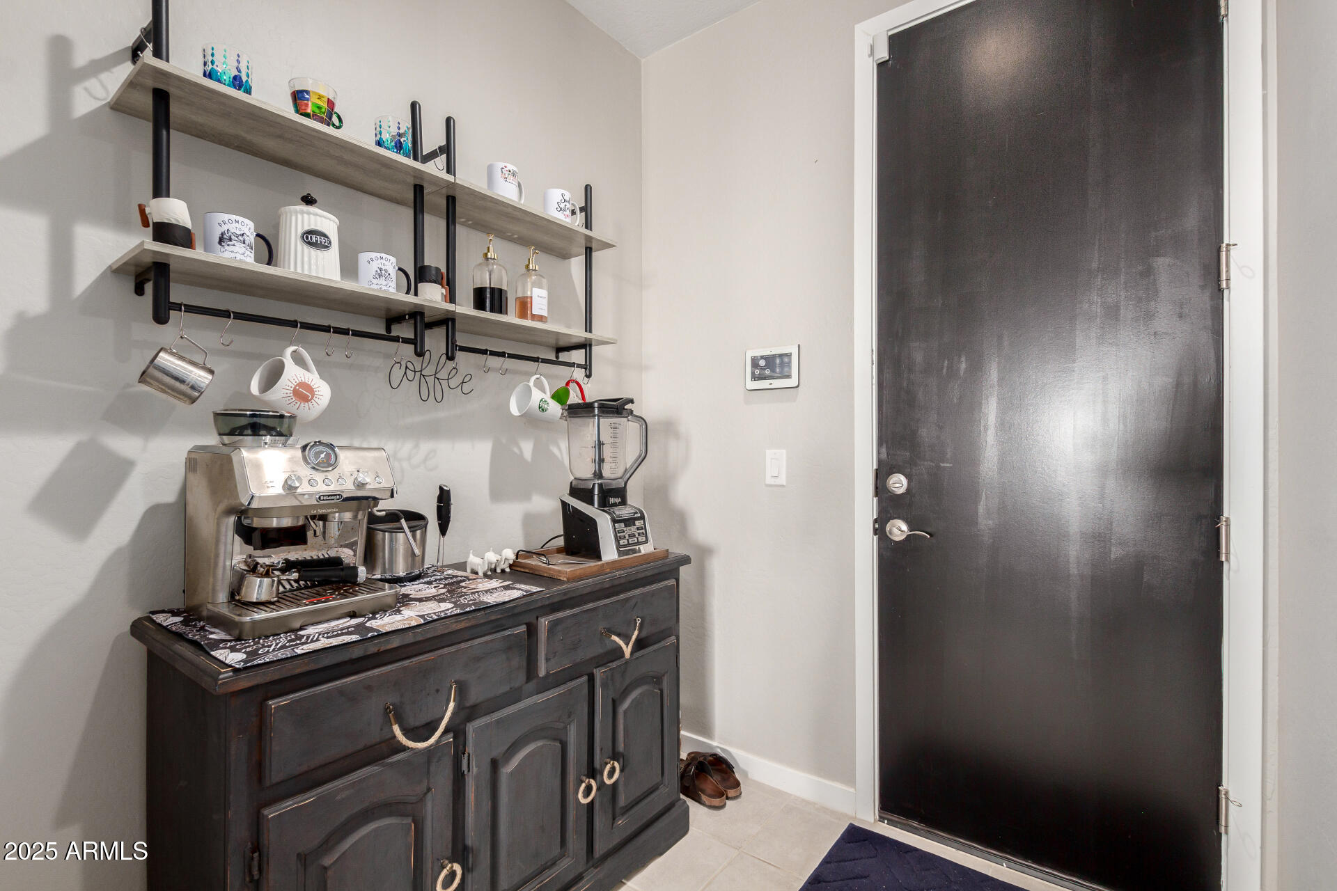 17454 West Red Fox Road Surprise, AZ 85387 - Photo 22 of 28 a kitchen with a sink a stove and cabinets
