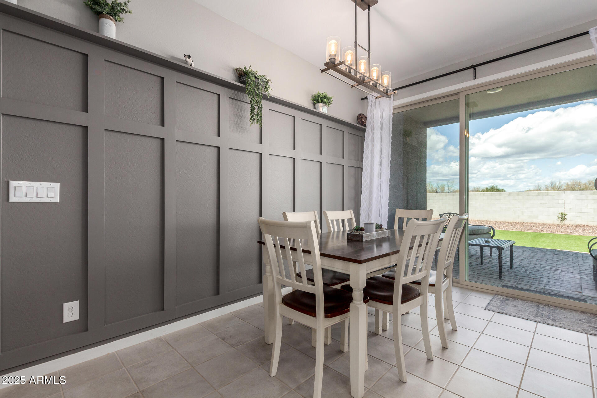 17454 West Red Fox Road Surprise, AZ 85387 - Photo 8 of 28 a view of a dining room with furniture window and outside view