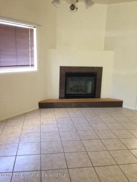 536 East 12th Street Rifle, CO 81650 - Photo 7 of 18 a view of an empty room with a window