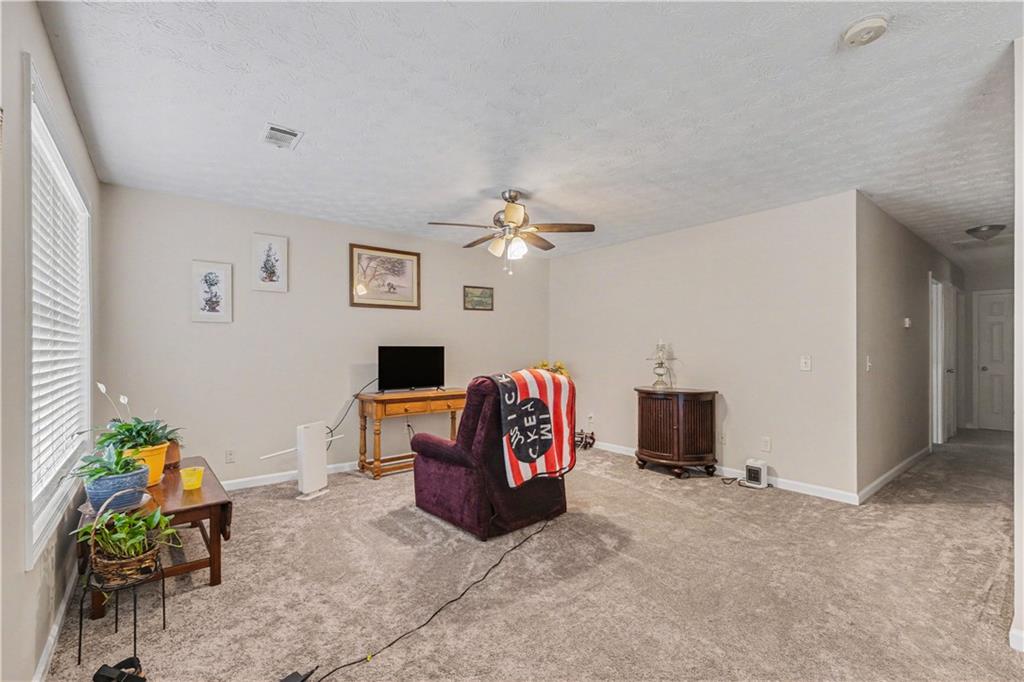 280 Courtyard Circle Winder, GA 30680 - Photo 3 of 24 a living room with furniture
