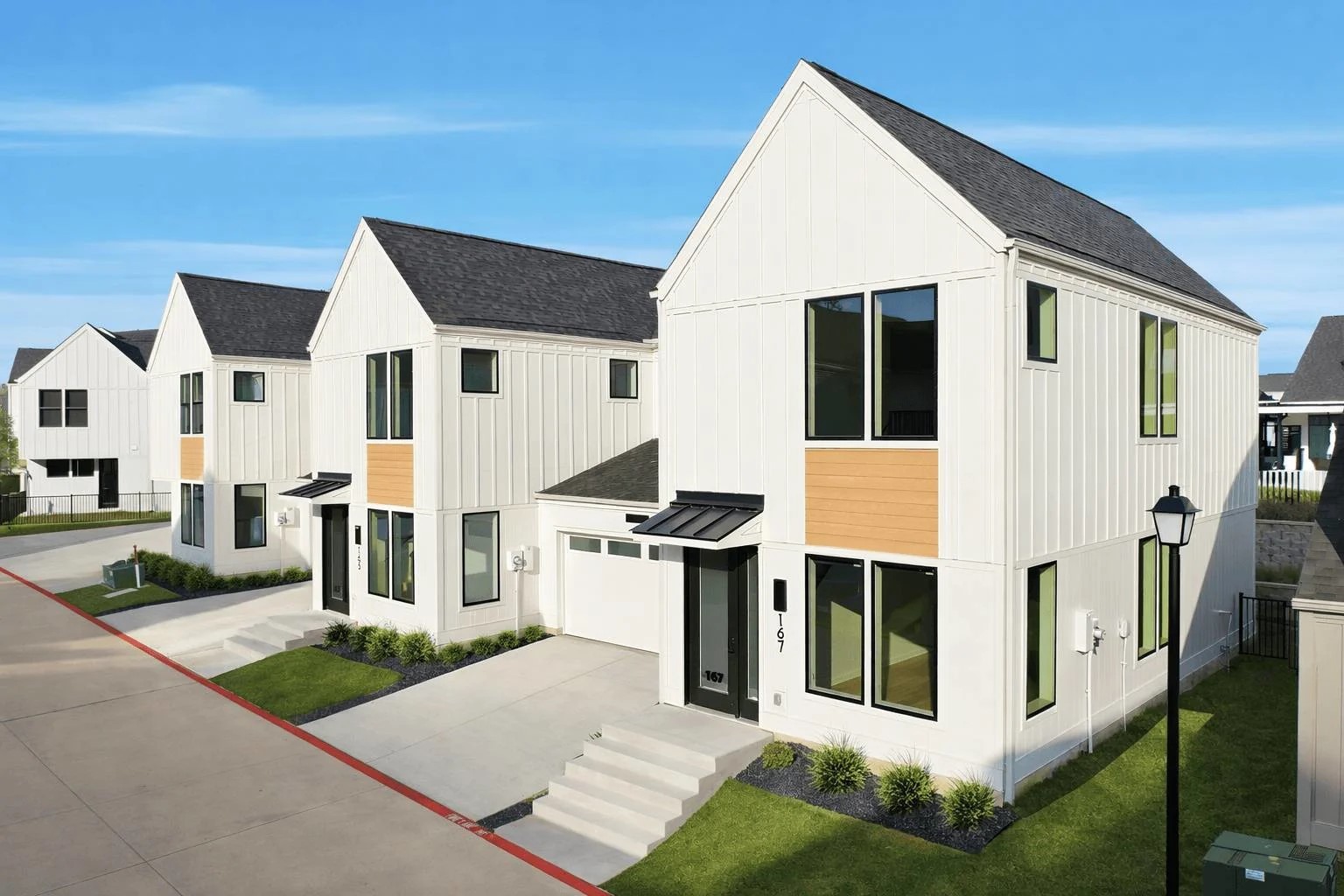 1941 Sawdust Road, Unit 126 Spring, TX 77380 - Photo 3 of 24 a view of a house with a yard