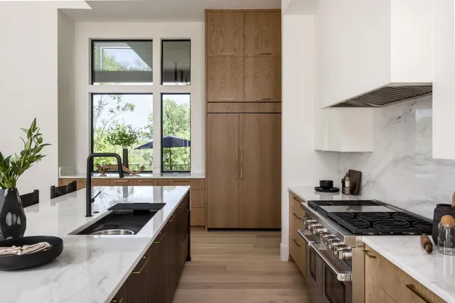 a spacious bathroom with a double vanity sink and a mirror