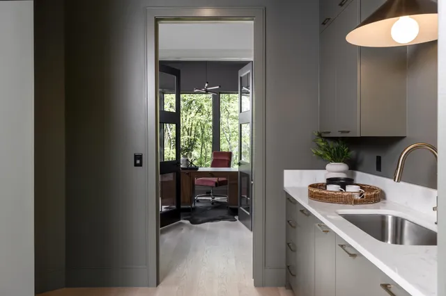 a view of balcony with wooden floor