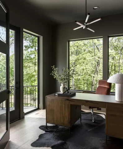 a view of a porch with wooden floor and stairs