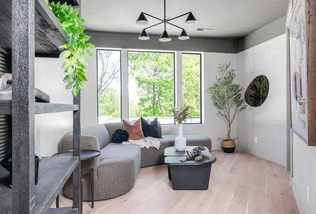 a view of a forest with a street