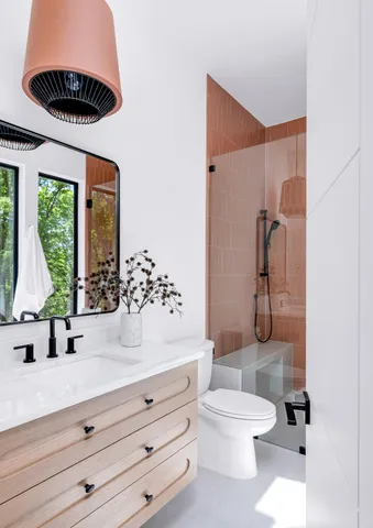 an aerial view of a house with swimming pool and garden