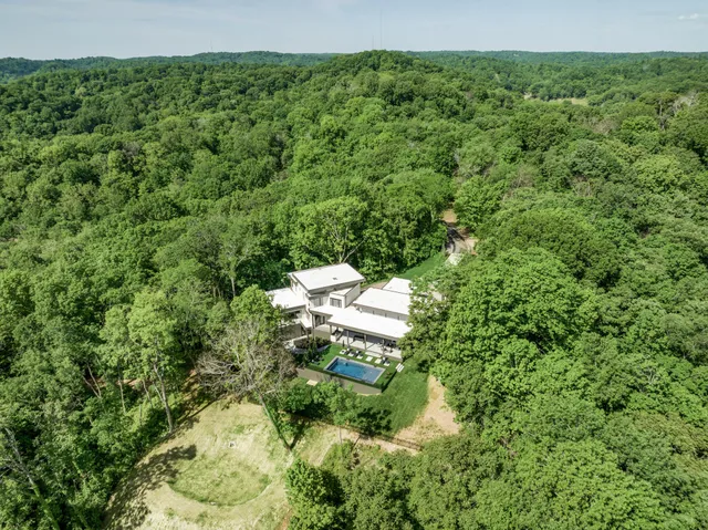 a living room with furniture and windows