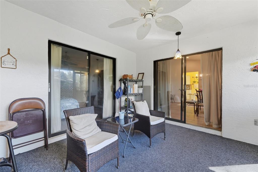 8174 Sturbridge Court, Unit 8174 Weeki Wachee, FL 34613 - Photo 18 of 32 a living room with furniture and a window