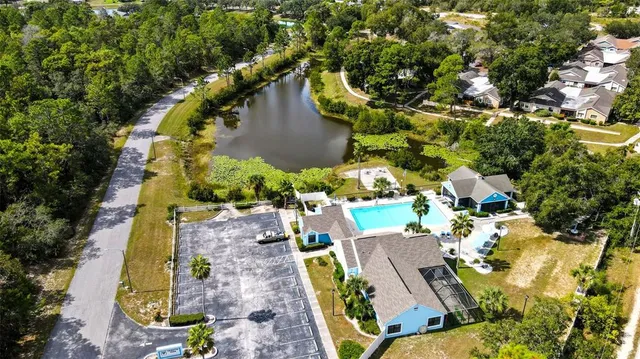 an aerial view of residential house with outdoor space