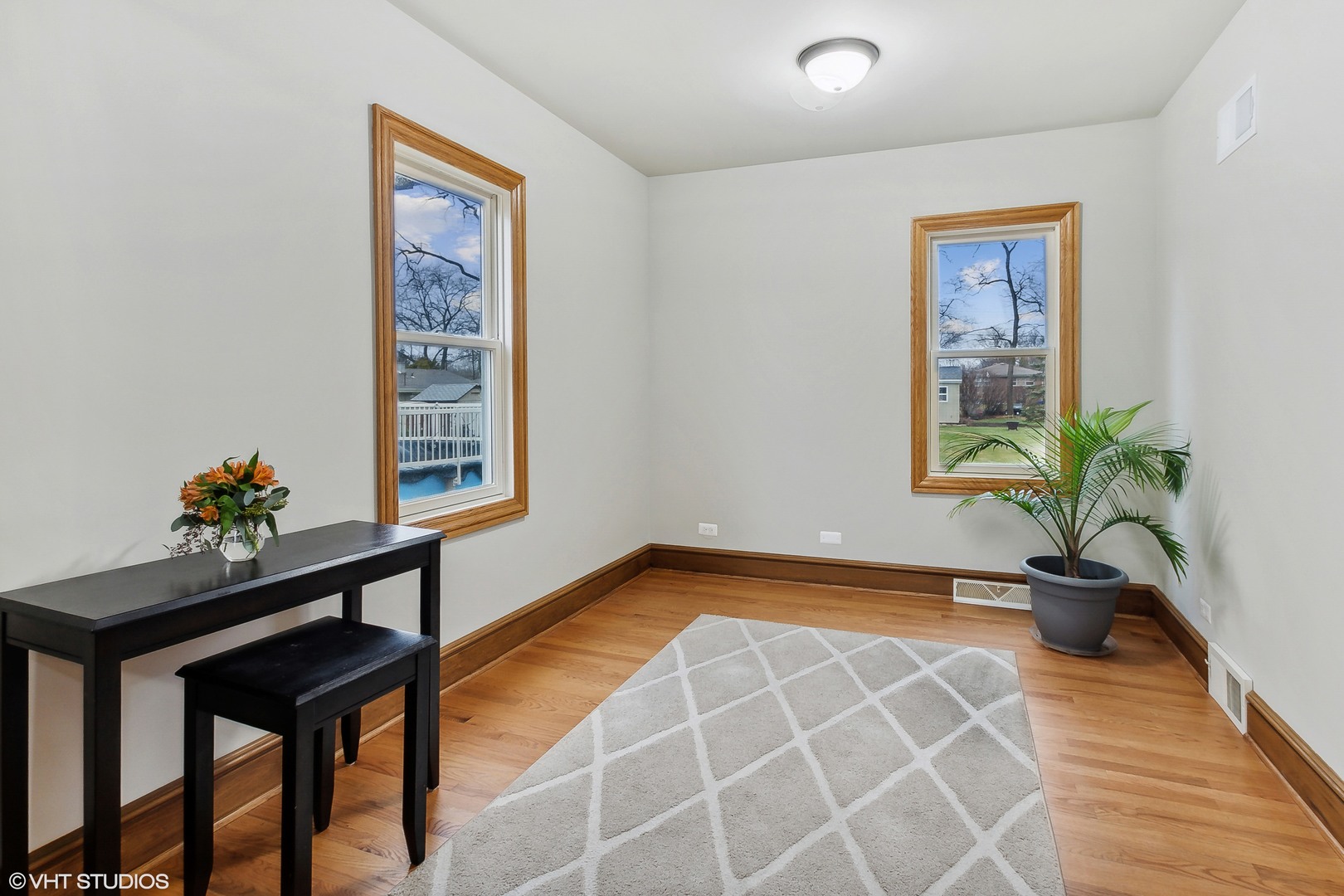 11034 Bryant Road Mokena, IL 60448 - Photo 7 of 19 a view of room with window and wooden floor