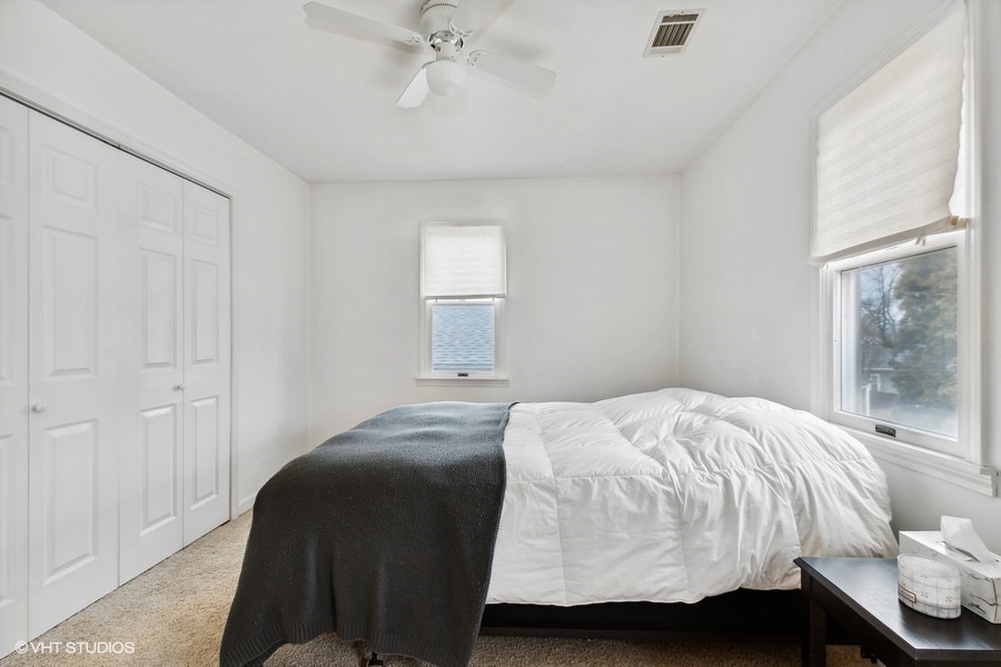 11034 Bryant Road Mokena, IL 60448 - Photo 10 of 19 a bedroom with a bed and window
