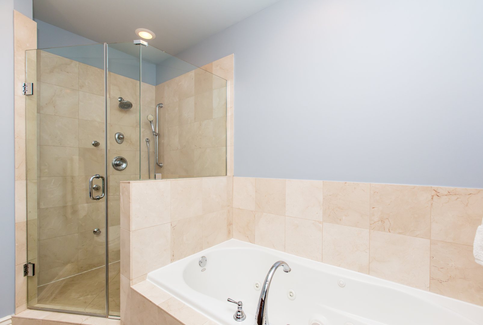 35 South Racine Avenue, Unit 4SE Chicago, IL 60607 - Photo 13 of 24 a bathroom with a bathtub and a shower