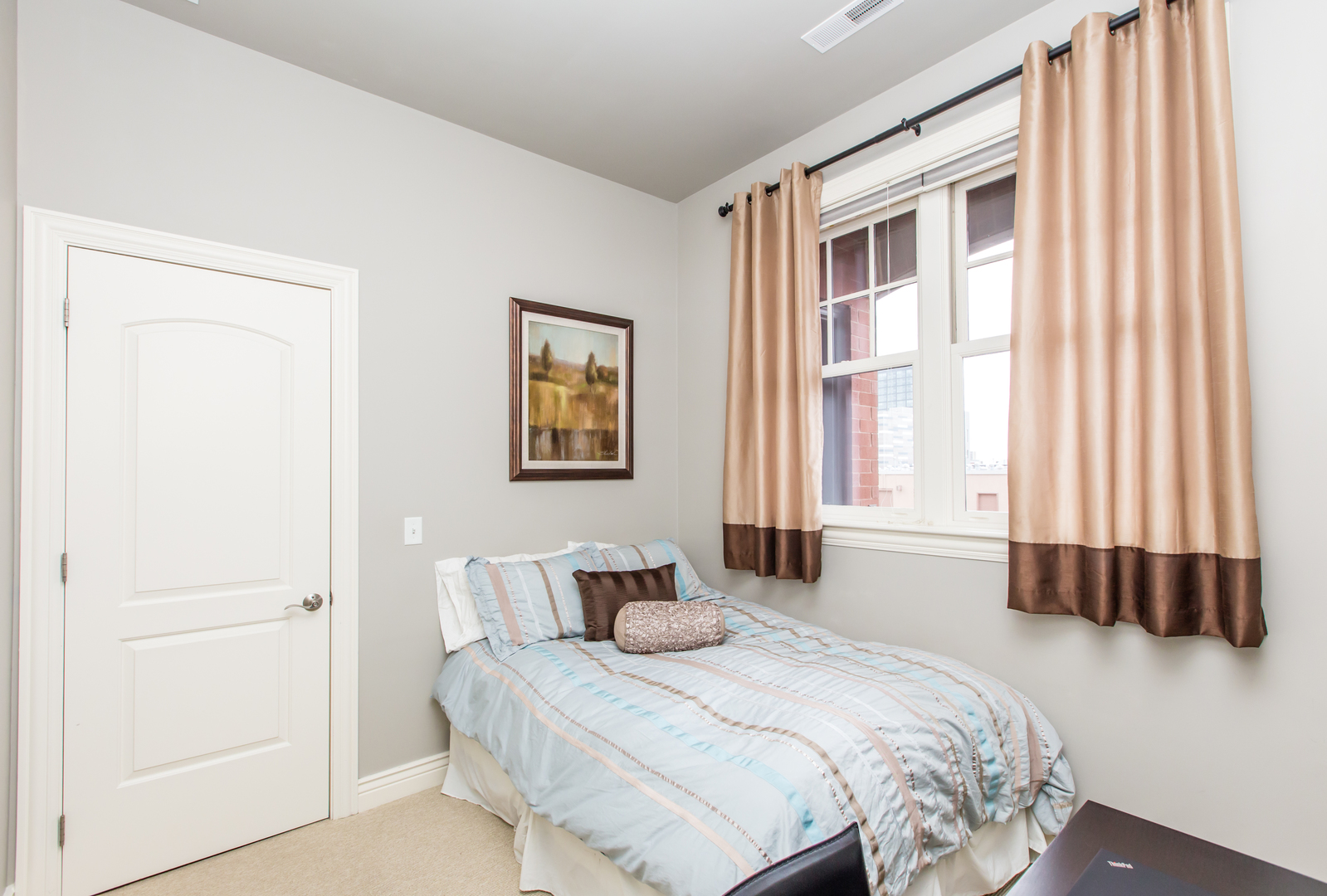35 South Racine Avenue, Unit 4SE Chicago, IL 60607 - Photo 16 of 24 a bedroom with a bed and a window