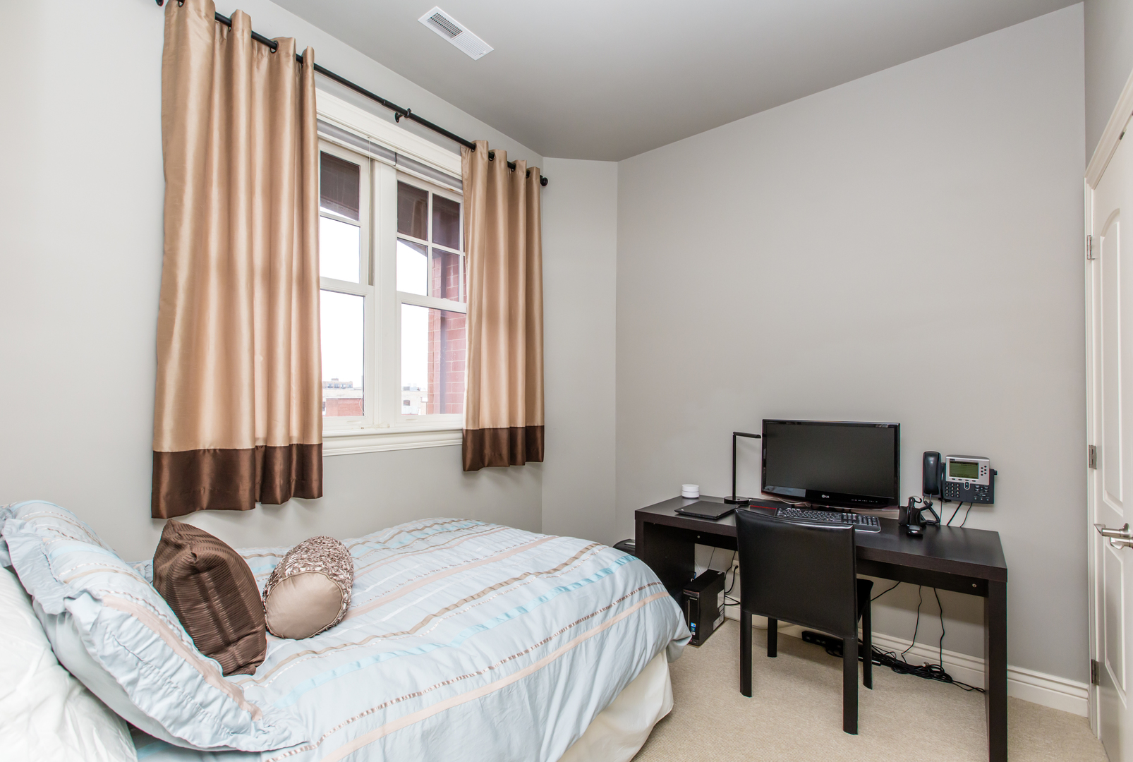 35 South Racine Avenue, Unit 4SE Chicago, IL 60607 - Photo 17 of 24 a bedroom with a bed and a window