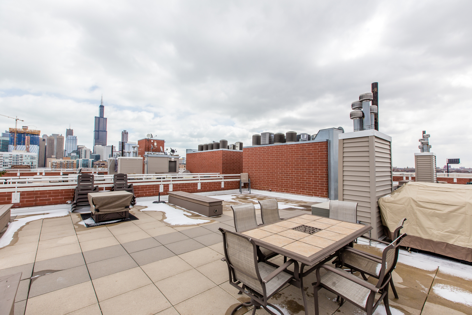 35 South Racine Avenue, Unit 4SE Chicago, IL 60607 - Photo 22 of 24 a terrace with outdoor seating