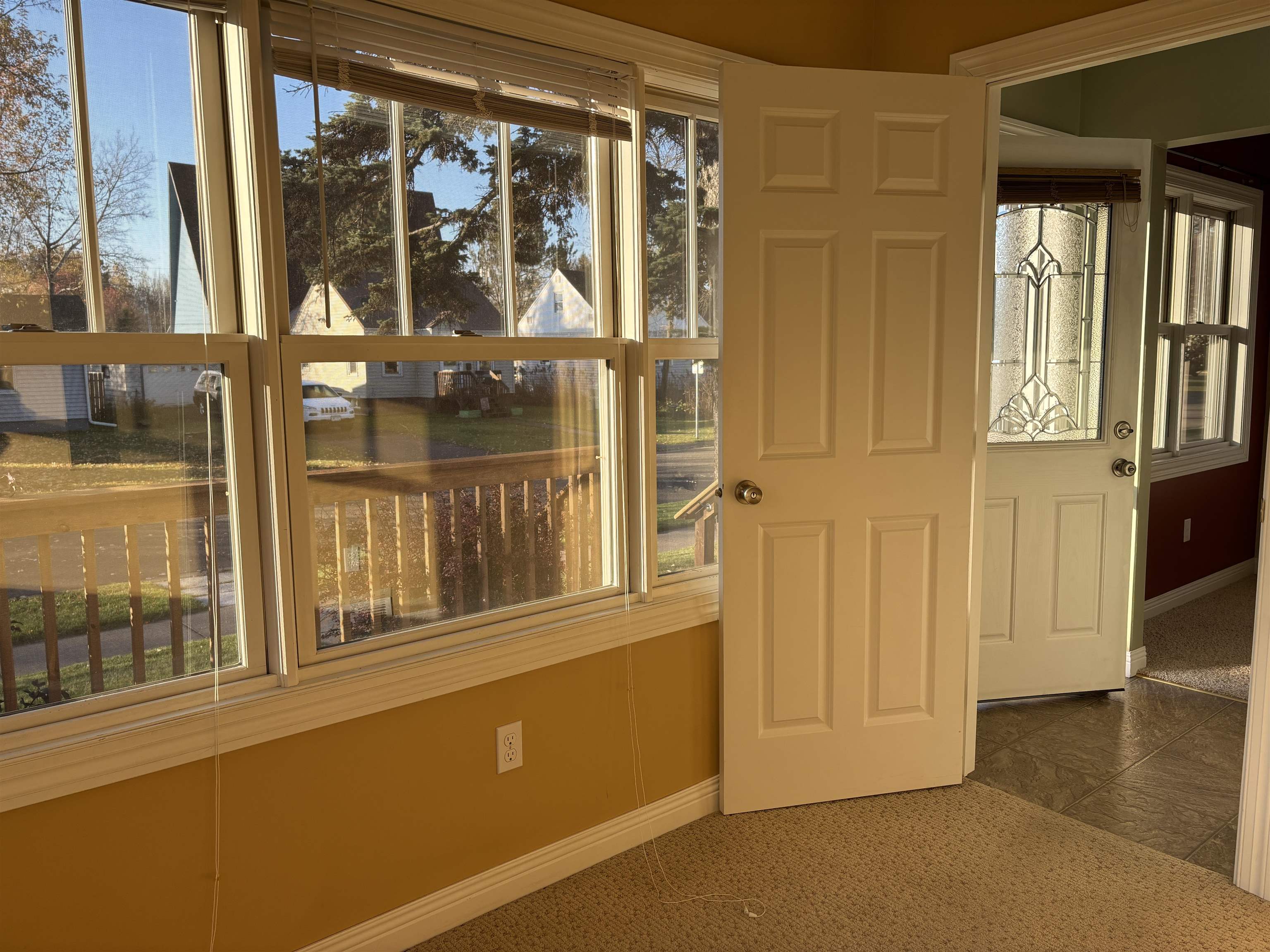 21 Oak Street Proctor, MN 55810 - Photo 20 of 26 Unfurnished sunroom featuring healthy amount of natural light and a water view