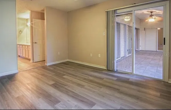 a view of a room with a hallway