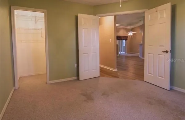 a bathroom with a sink toilet and mirror