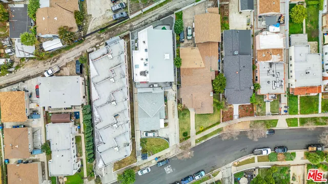 aerial view of residential houses with outdoor space