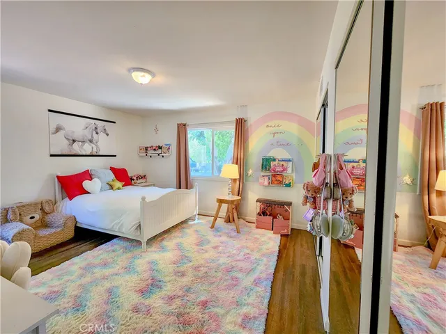 a bed room with a bed and a couch