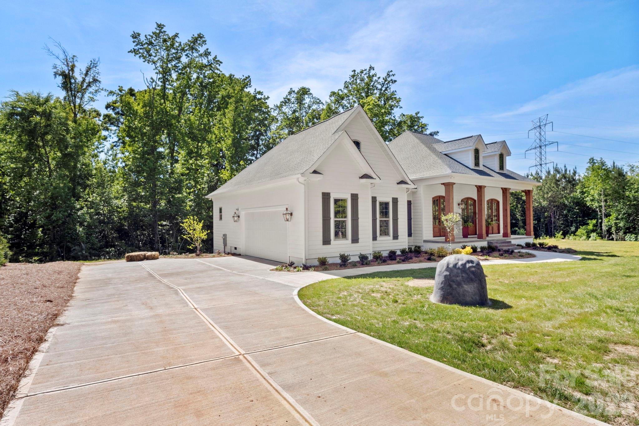 1167 Tirzah Road Rock Hill, SC 29732 - Photo 23 of 25 a front view of a house with garden