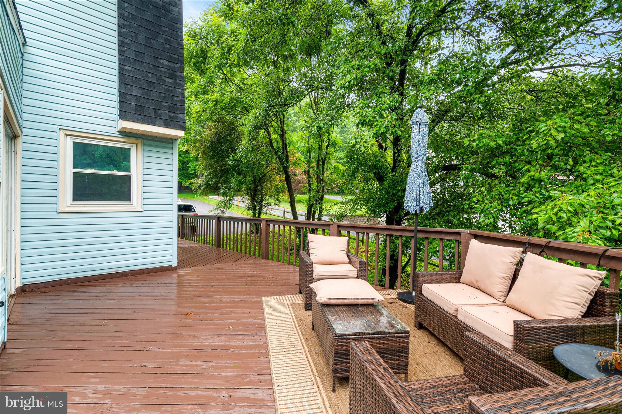 4217 Bill Moxley Road Mount Airy, MD 21771 - Photo 44 of 57 a view of balcony with furniture and garden