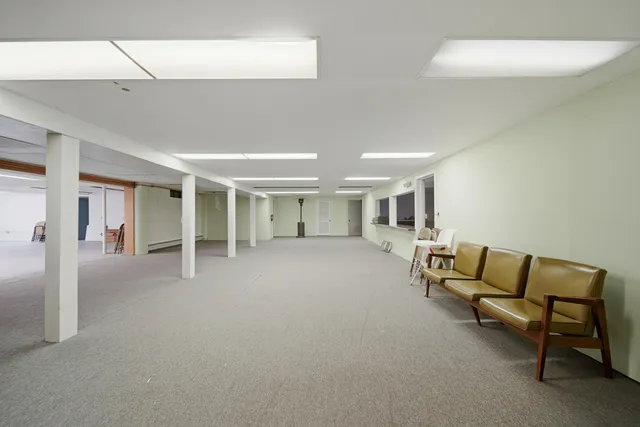 a view of a livingroom with furniture and a couch