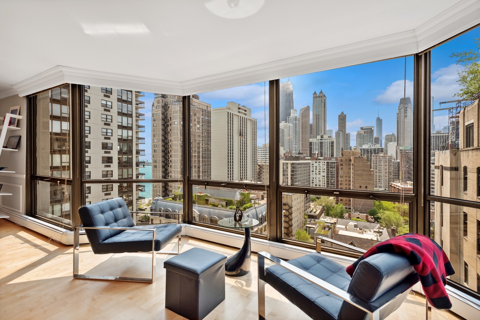 1310 North Ritchie Court, Unit 19B Chicago, IL 60610 - Photo 6 of 30 a living room with furniture and a floor to ceiling window