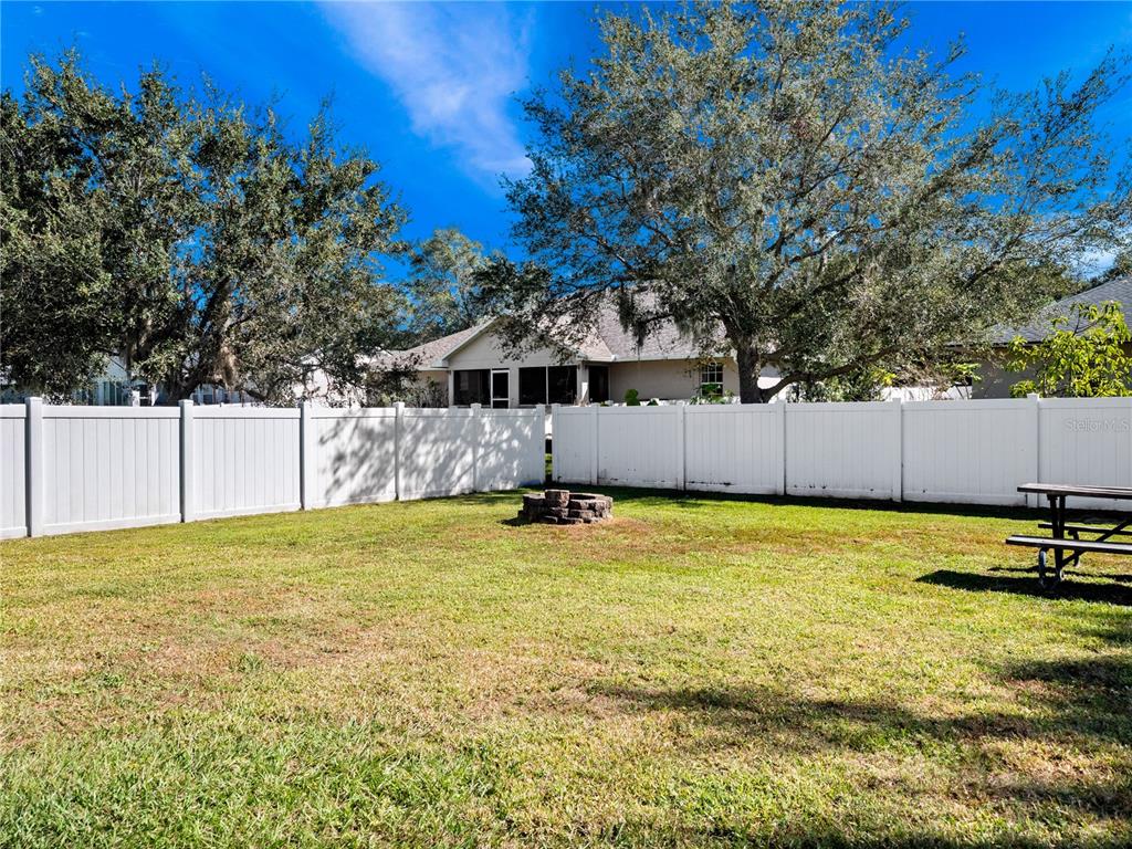117 Rachel Lin Lane St. Cloud, FL 34771 - Photo 20 of 28 a swimming pool and yard