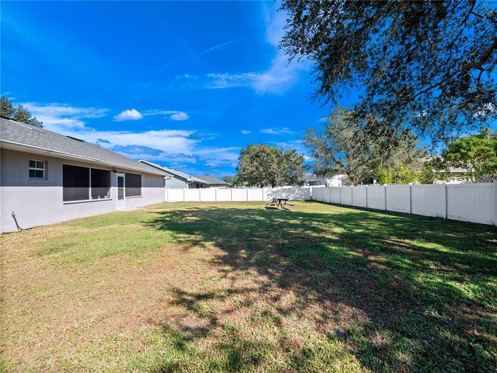 117 Rachel Lin Lane St. Cloud, FL 34771 - Photo 22 of 28 a backyard of a house