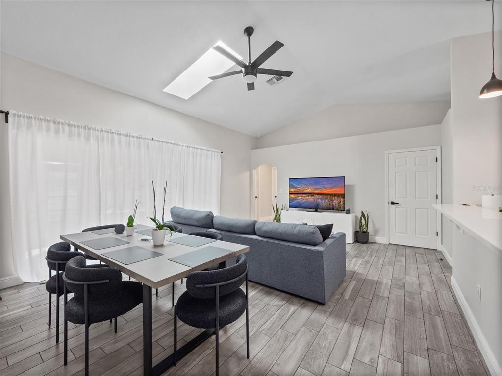 117 Rachel Lin Lane St. Cloud, FL 34771 - Photo 8 of 28 a living room with furniture and a wooden floor