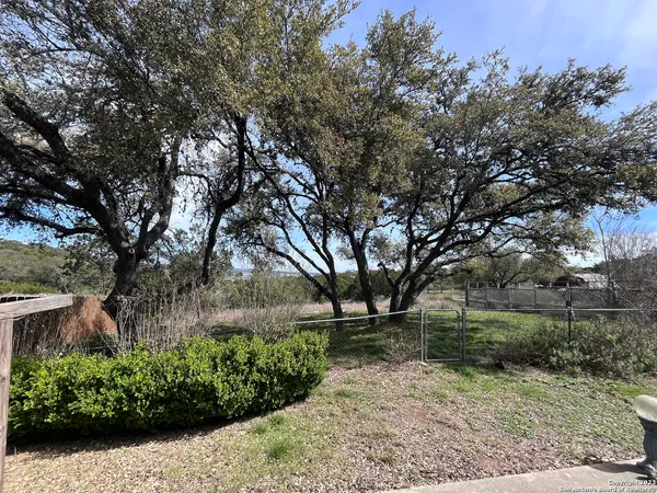 a view of backyard with green space