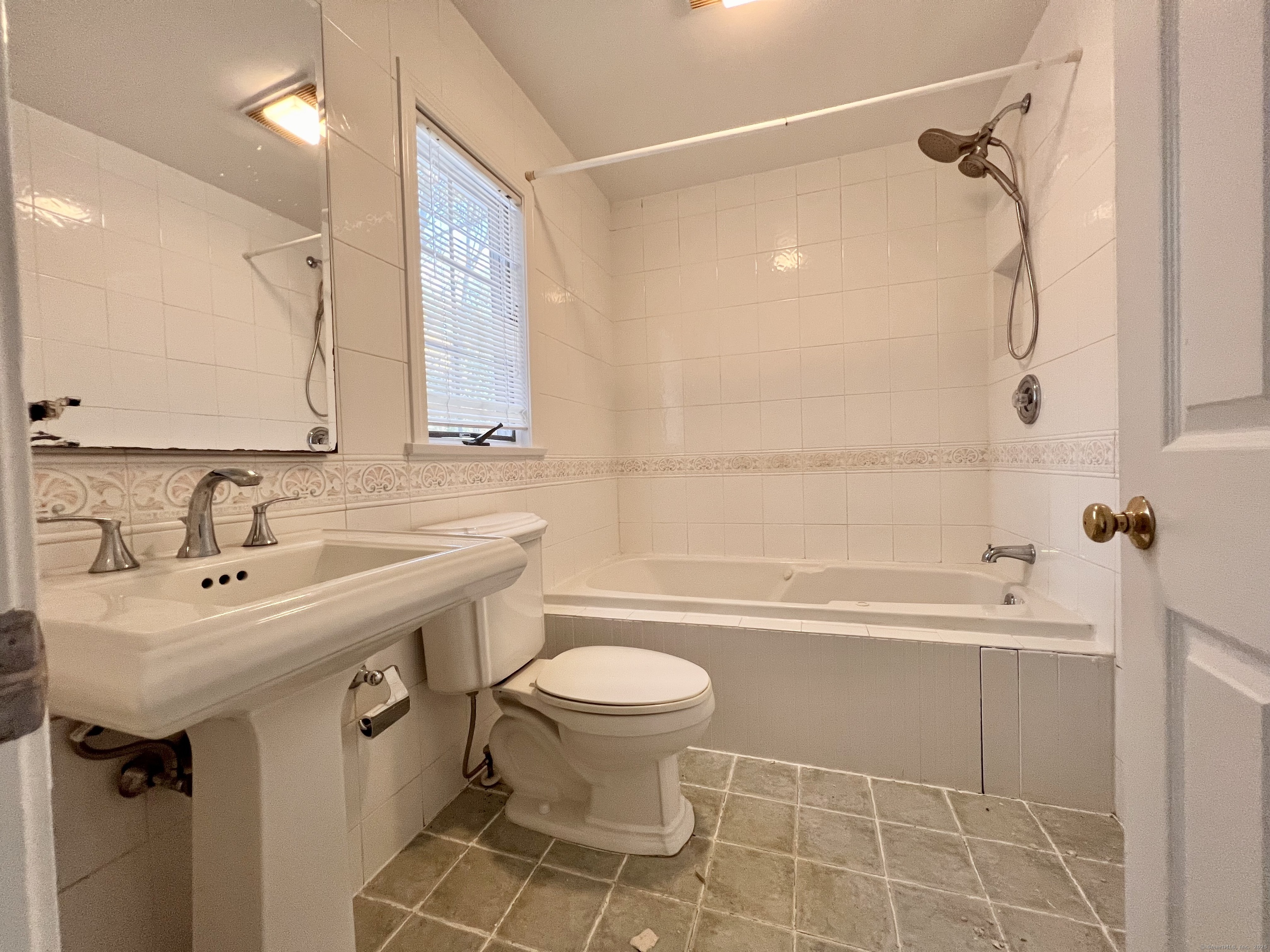 56 Partrick Road Westport, CT 06880 - Photo 11 of 21 a bathroom with a sink toilet and shower