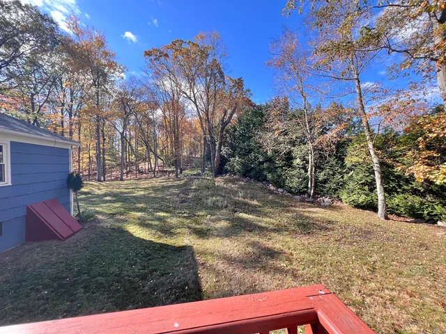 a view of a yard with an trees