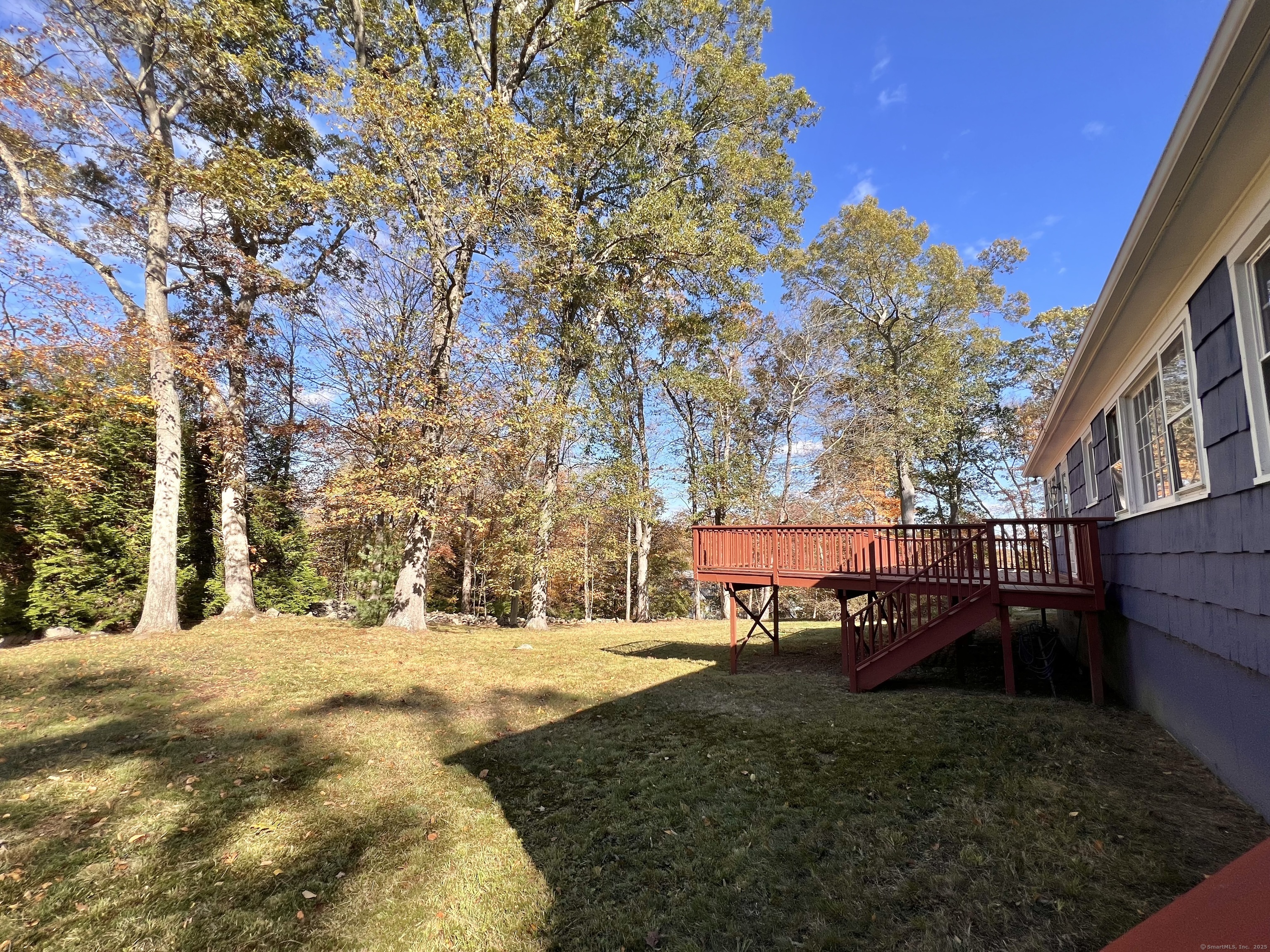 56 Partrick Road Westport, CT 06880 - Photo 17 of 21 a view of backyard with wooden fence