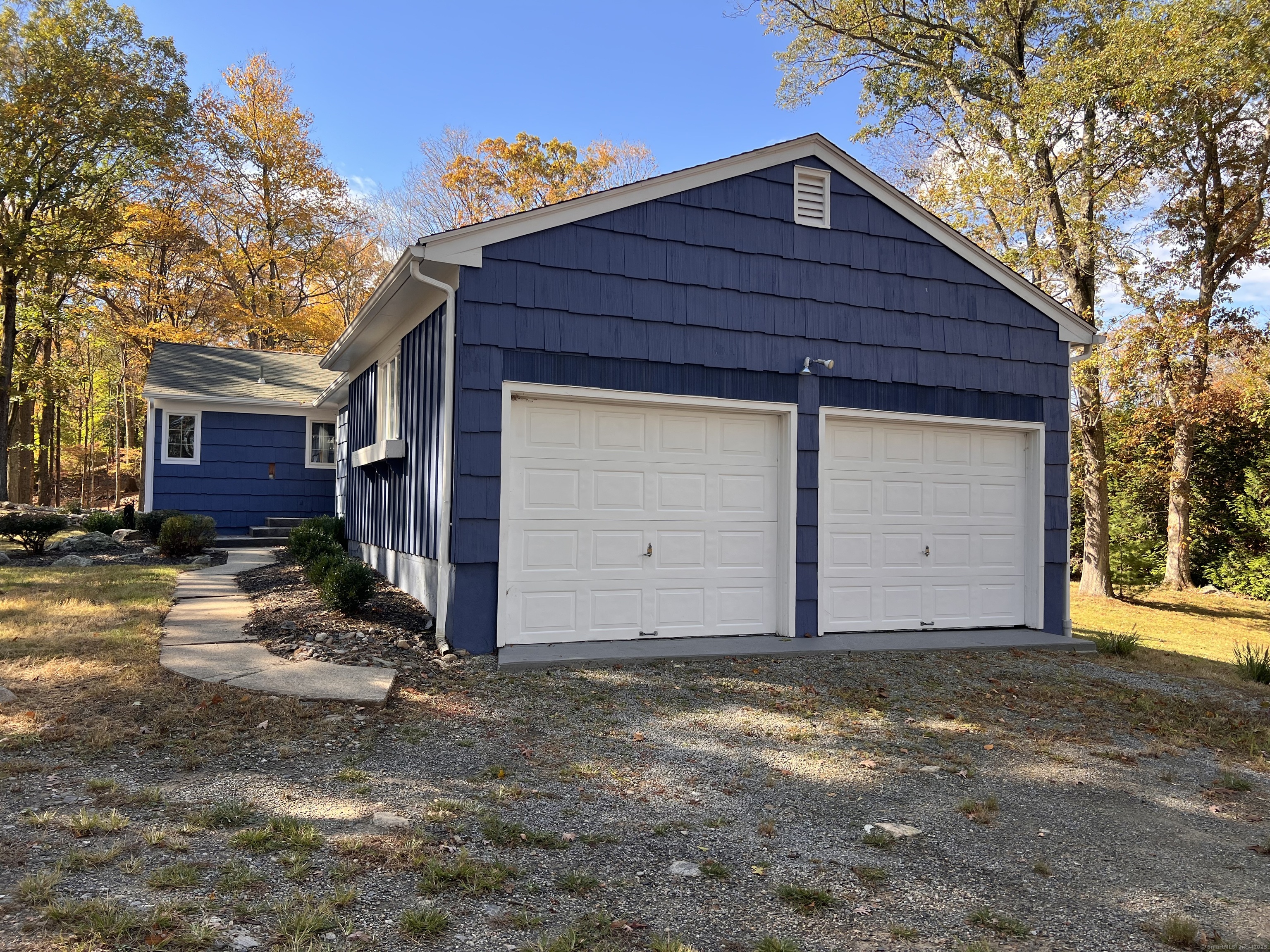 56 Partrick Road Westport, CT 06880 - Photo 4 of 21 a view of a house with a yard