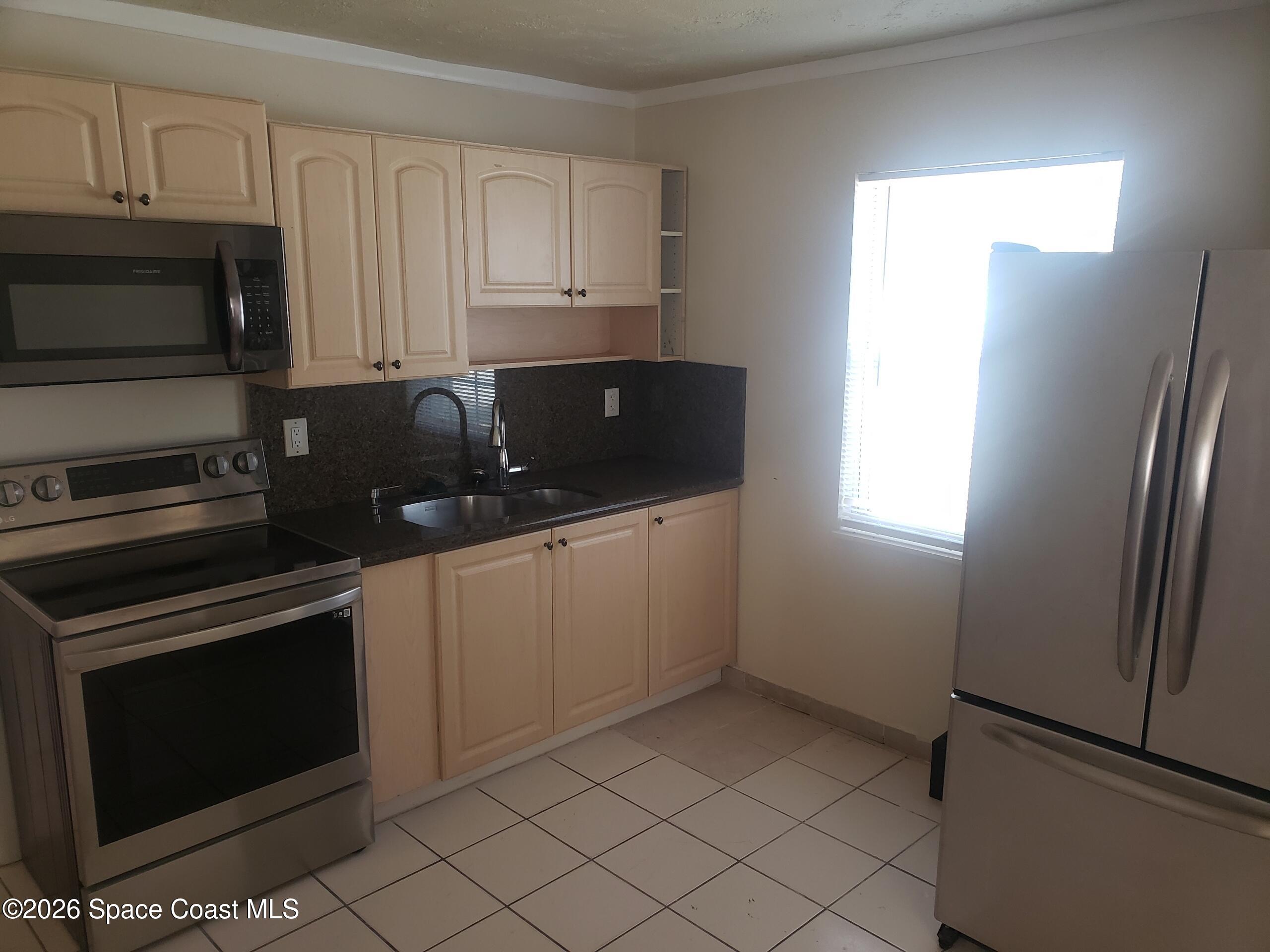 2114 Henry Street Northeast, Unit B Palm Bay, FL 32905 - Photo 6 of 10 5