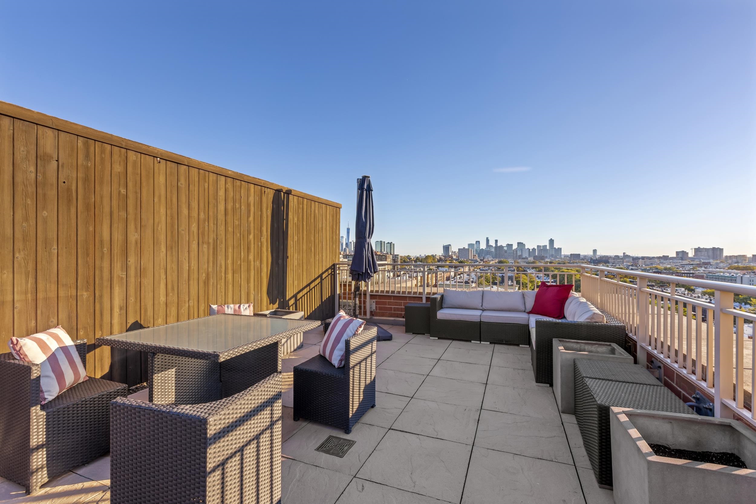 1450 Washington Street, Unit 608 Hoboken, NJ 07030 - Photo 18 of 44 a view of a terrace with furniture