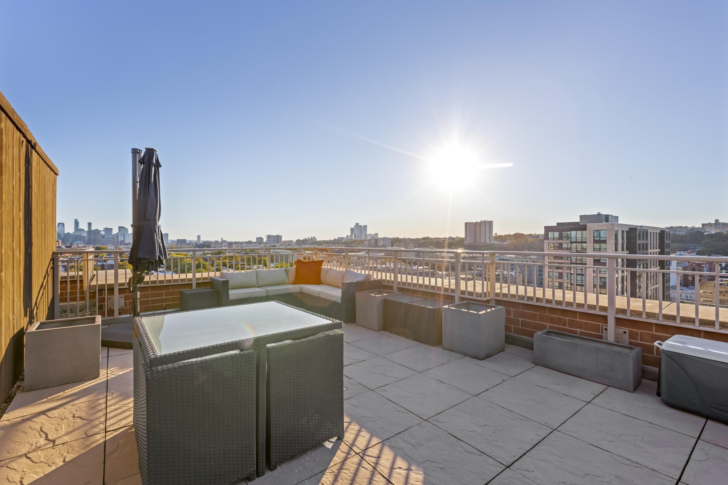1450 Washington Street, Unit 608 Hoboken, NJ 07030 - Photo 19 of 44 a view of a terrace with city view