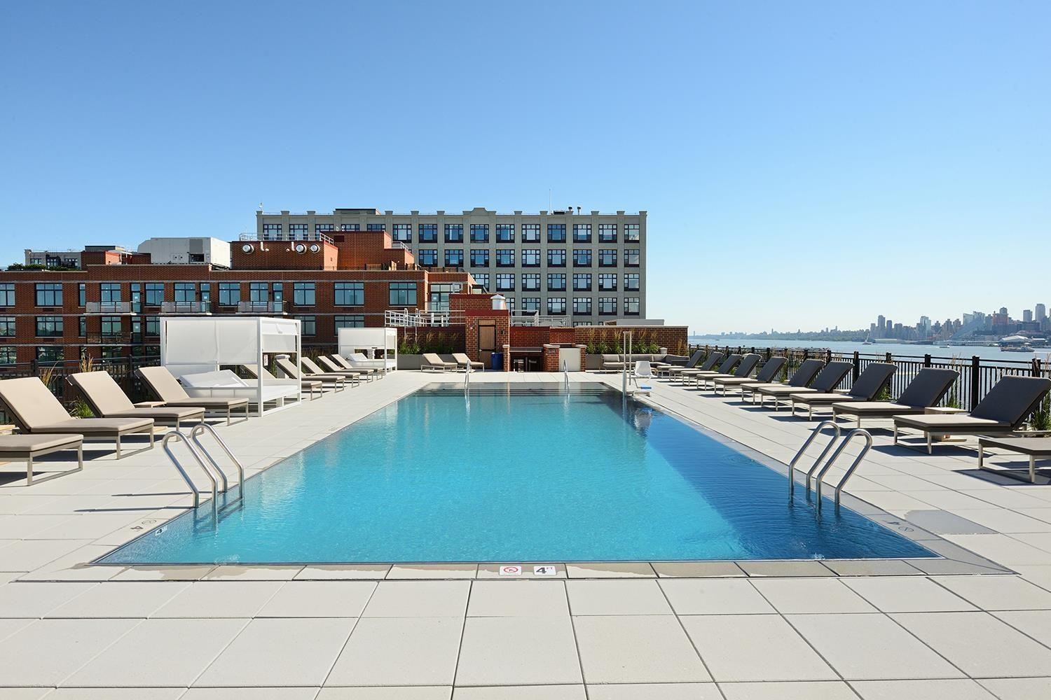 1450 Washington Street, Unit 608 Hoboken, NJ 07030 - Photo 25 of 44 a view of a terrace with chairs