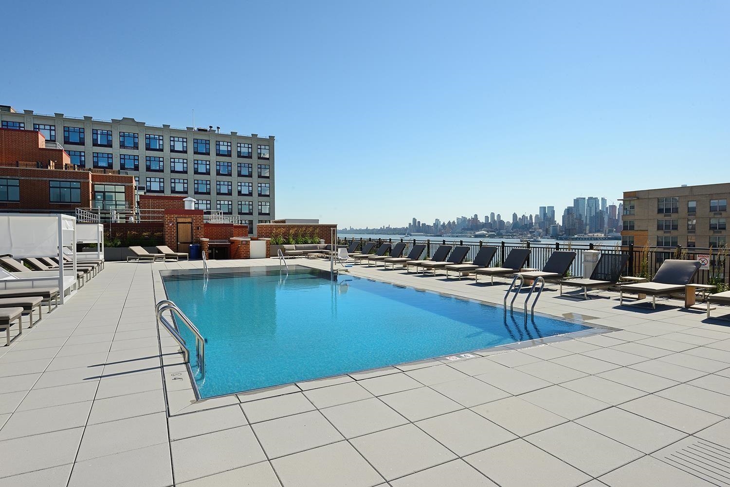 1450 Washington Street, Unit 608 Hoboken, NJ 07030 - Photo 26 of 44 a view of a terrace with chairs