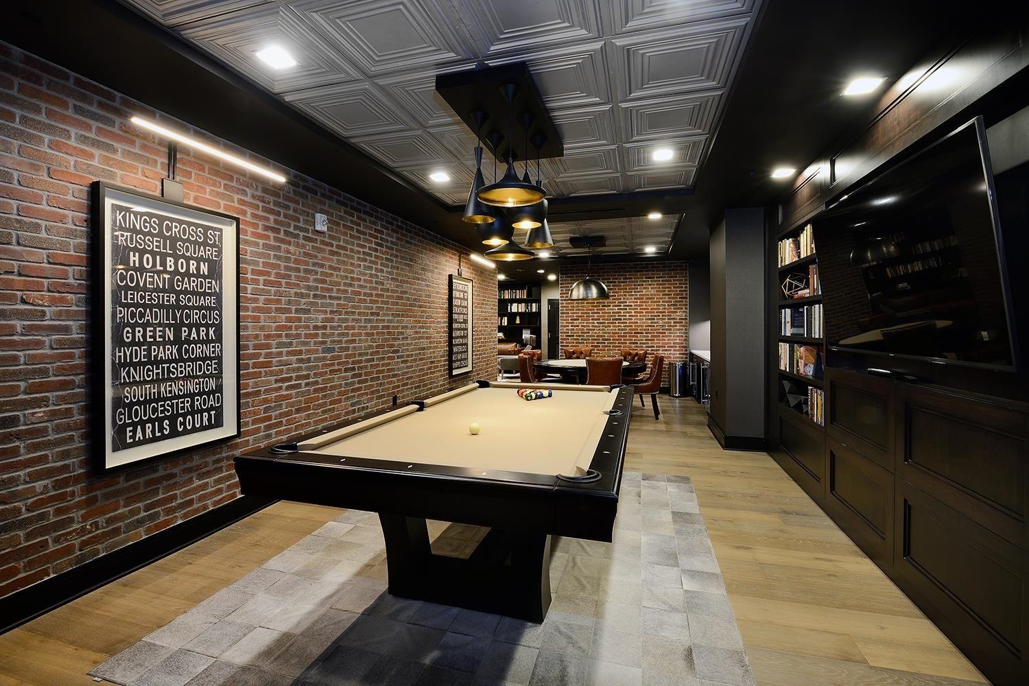 1450 Washington Street, Unit 608 Hoboken, NJ 07030 - Photo 27 of 44 a room with pool table flat screen tv and a table