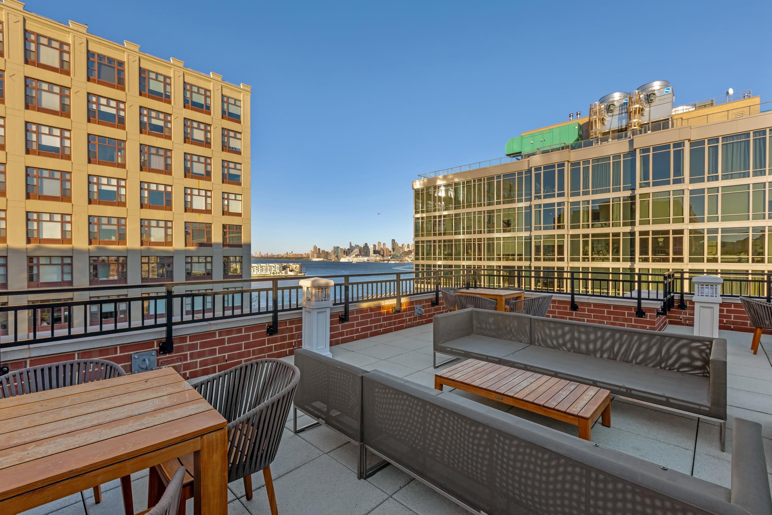 1450 Washington Street, Unit 608 Hoboken, NJ 07030 - Photo 29 of 44 a view of a balcony with a couch