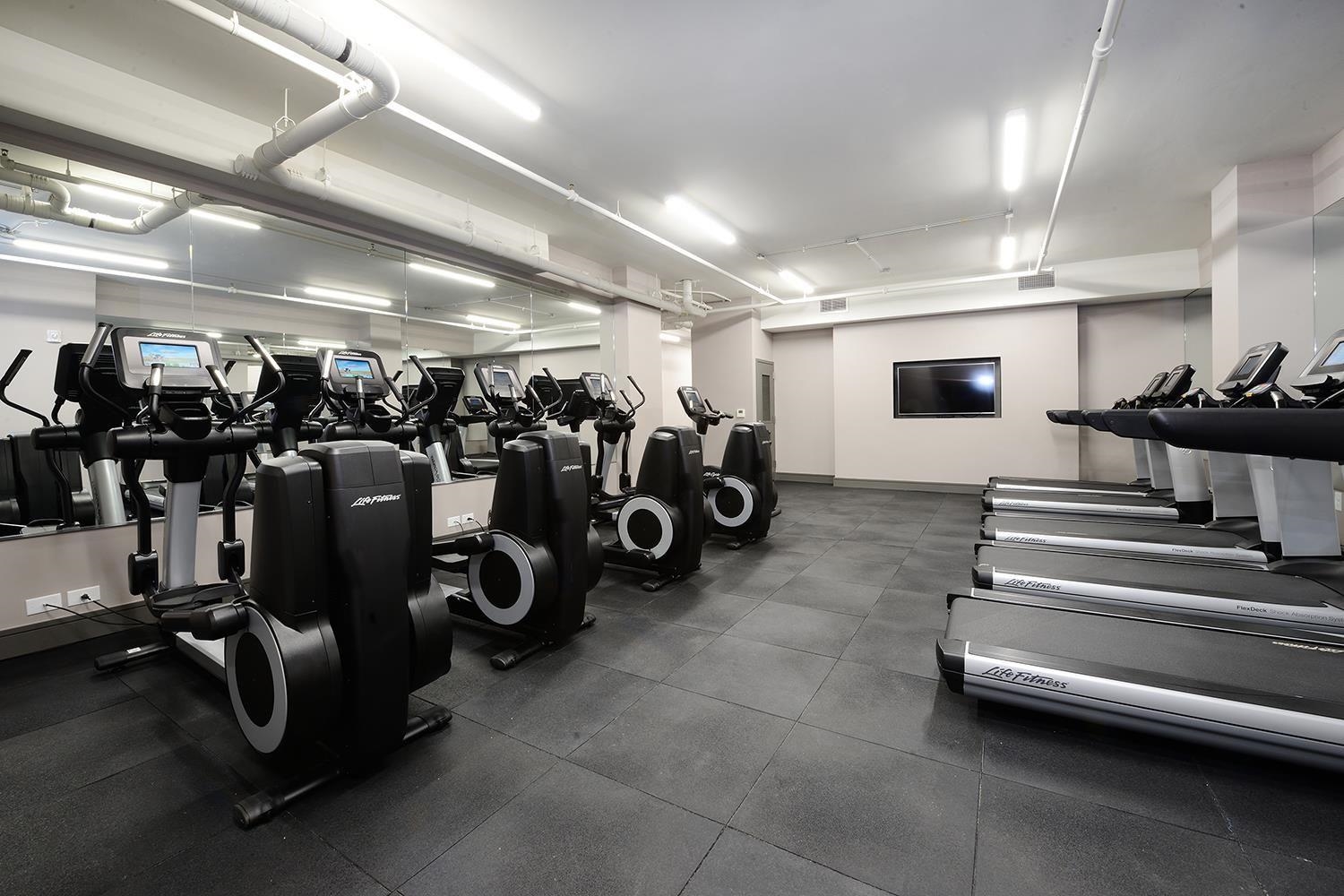 1450 Washington Street, Unit 608 Hoboken, NJ 07030 - Photo 30 of 44 a view of a room with gym equipment
